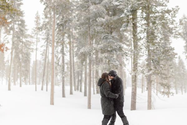 couple in a snowy forest