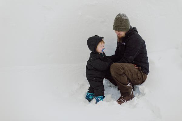 Dad and son in the snow